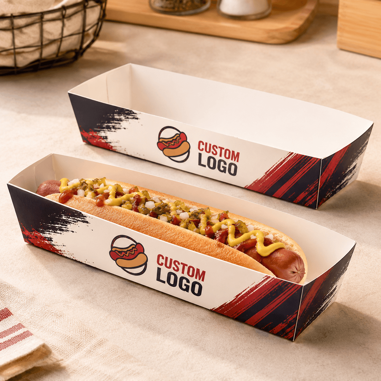 Illustrative custom printed open-top paperboard trays sized for complete hot dogs